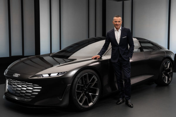 Henrik Wenders, Head of Brand, stood in front of an Audi